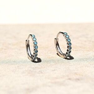 Sterling Silver Mini Hoop Huggies with Blue Stones